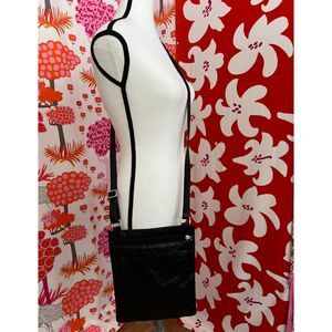 Wilsons black leather crossbody bag + change purse in EUC.